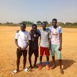 young players training on sports field
